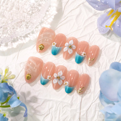 Künstlerisches Muscheln-inspiriertes Nagelset Brehn