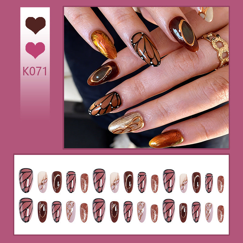 Kunstnagelset mit elegantem Gold- und Schwarzdesign Brehn