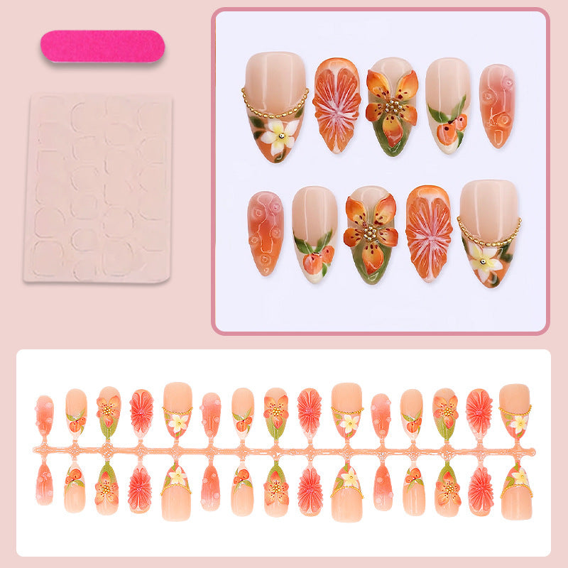 Kunstnagelset mit romantischen Blüten und fruchtigen Akzenten Brehn