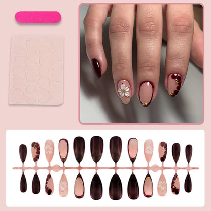 Kunstnagelset mit eleganten Blumenmustern und Glamour-Akzenten Brehn