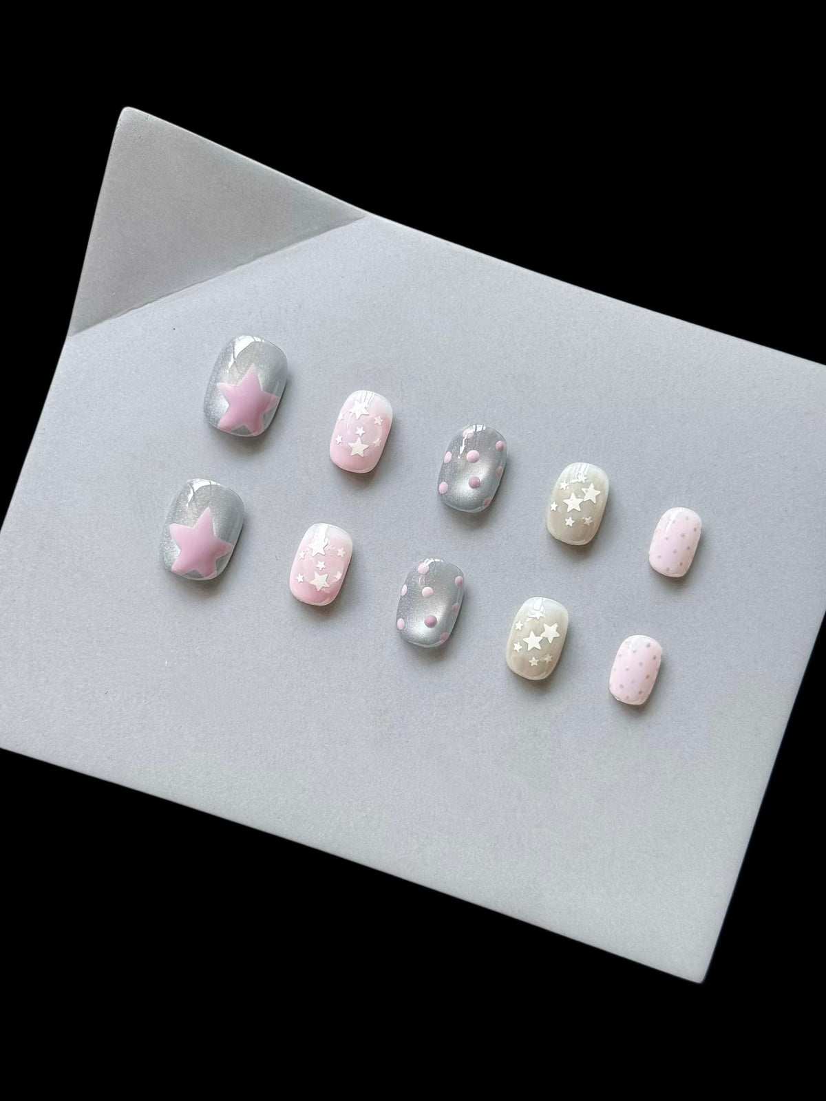 Dekoratives Press-On Nagelkunstset mit himmlischem Thema
