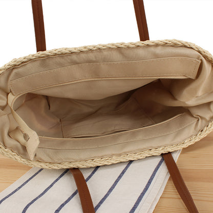 Geflochtene Bast-Handtasche mit Ledergriffen Brehn