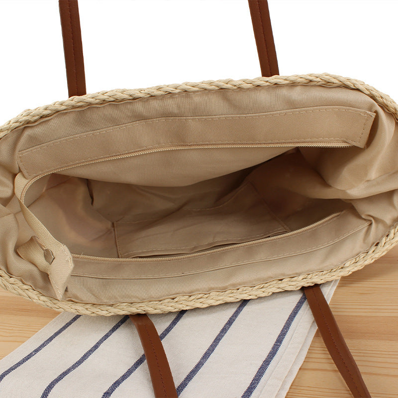 Modische Strohtasche mit Lederdetails Brehn
