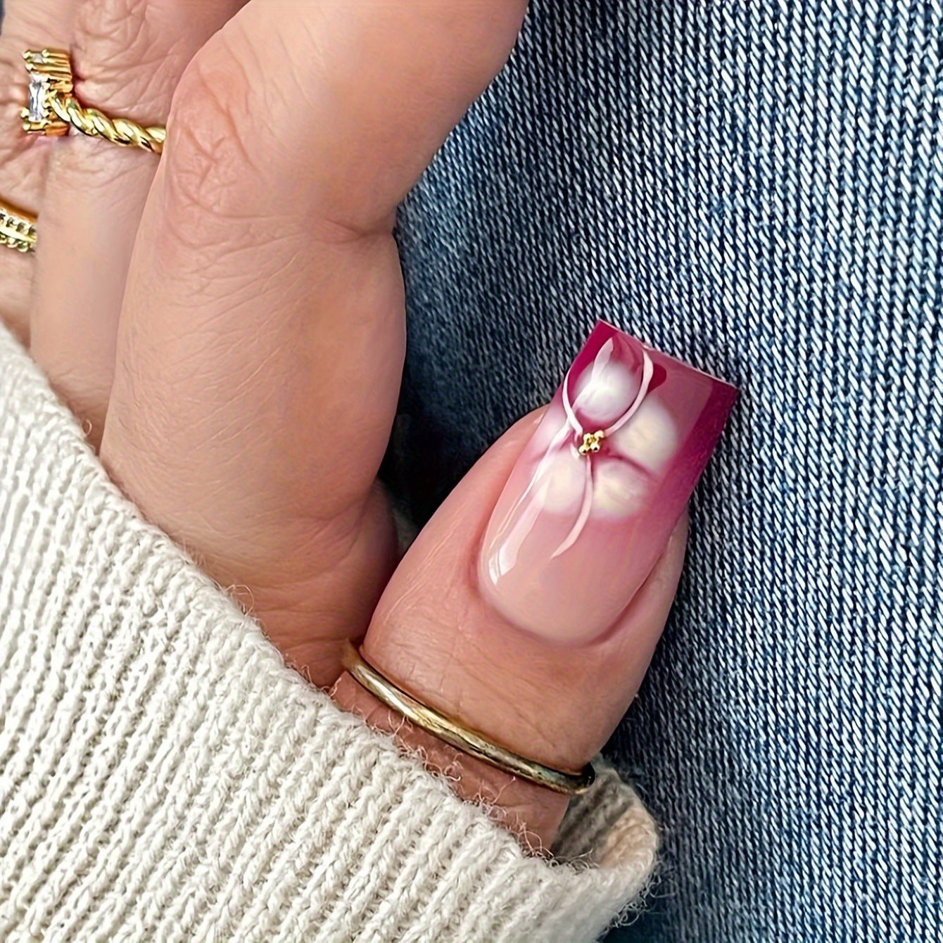Künstlerische Gel-Nagelverlängerungen mit floralem Design Brehn