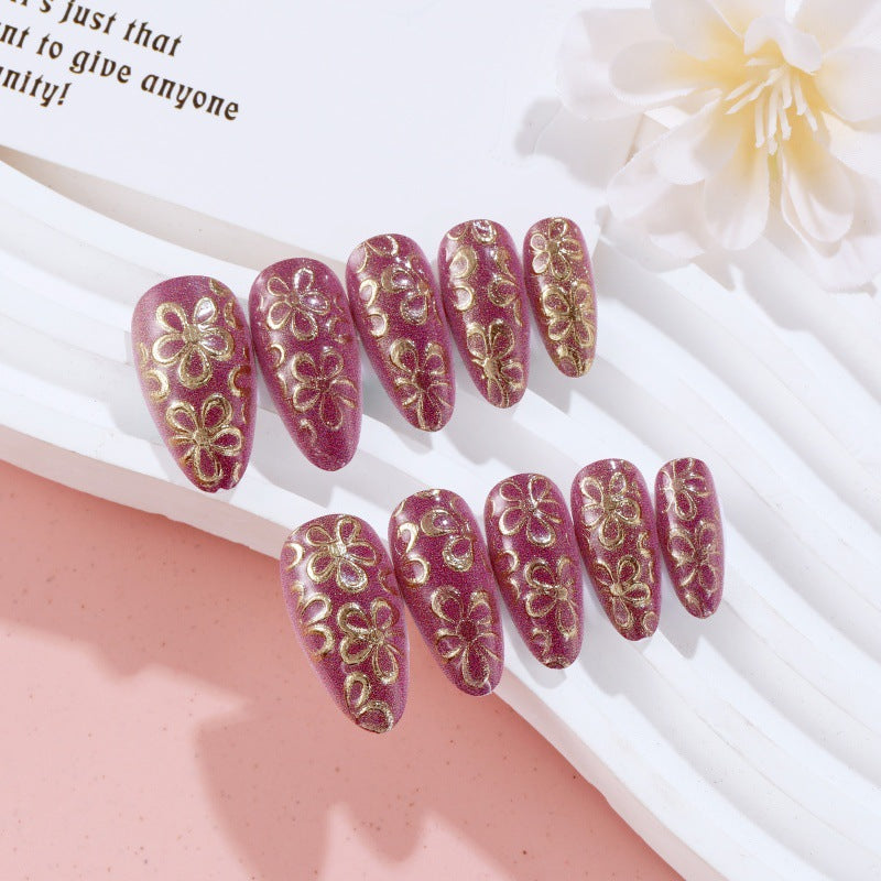 Glitzernde Kunstnägel mit floralen Mustern Brehn