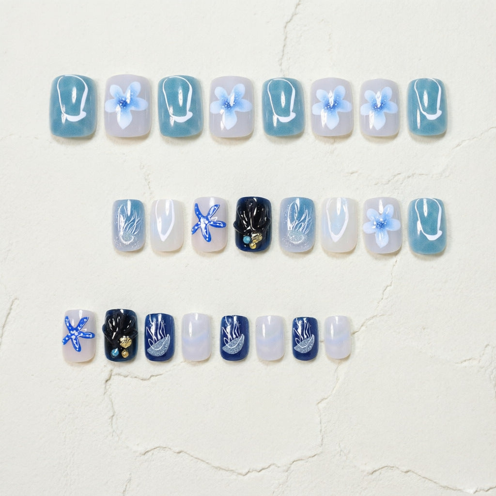 Ozean-inspiirertes künstlerisches Press-On-Nageldesign Brehn
