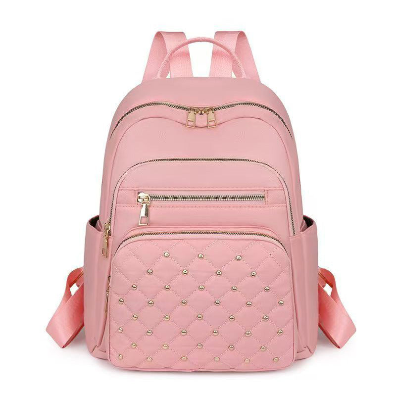 Damen gesteppter Rucksack mit dekorativen Nieten Brehn