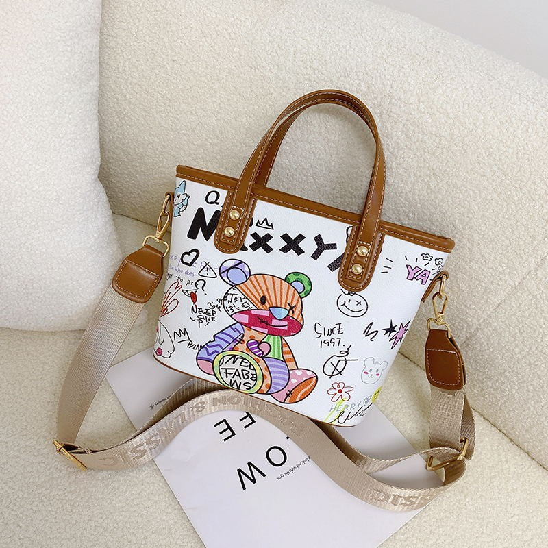 Verspielte illustrierte Schultertasche