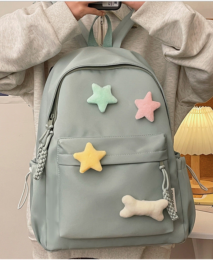Niedlicher verspielter Rucksack mit Stern-Applikationen