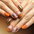 Dekorativer Press-On Nagelkunst-Set mit Kürbisdesign Brehn