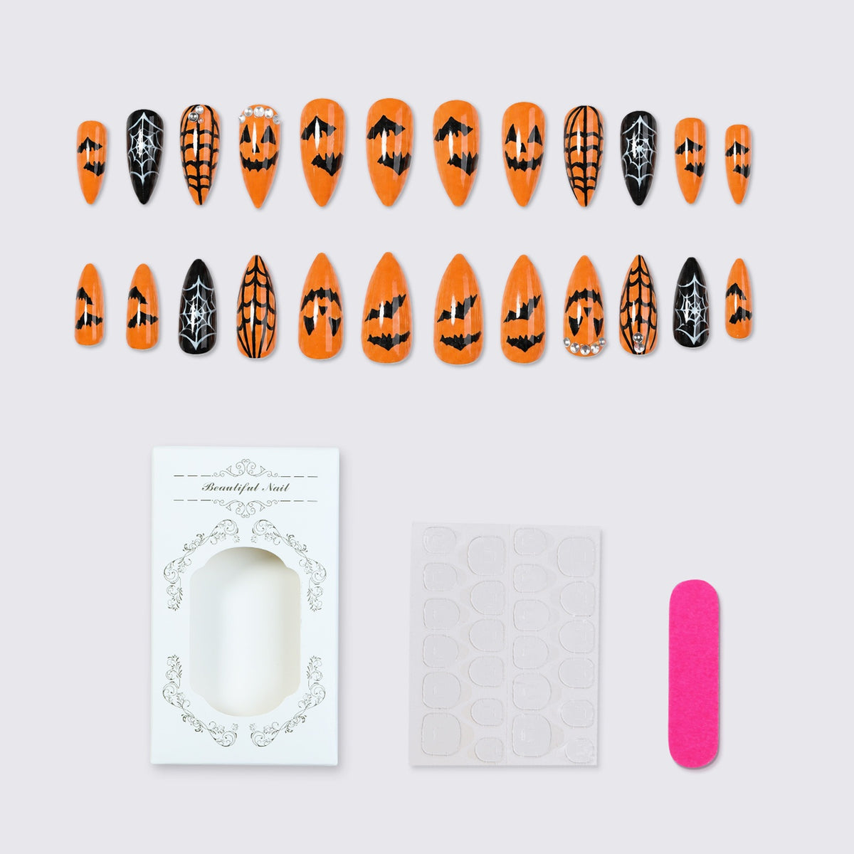 Kunstnagelset mit Halloween-Motiven und Glitzerelementen Brehn