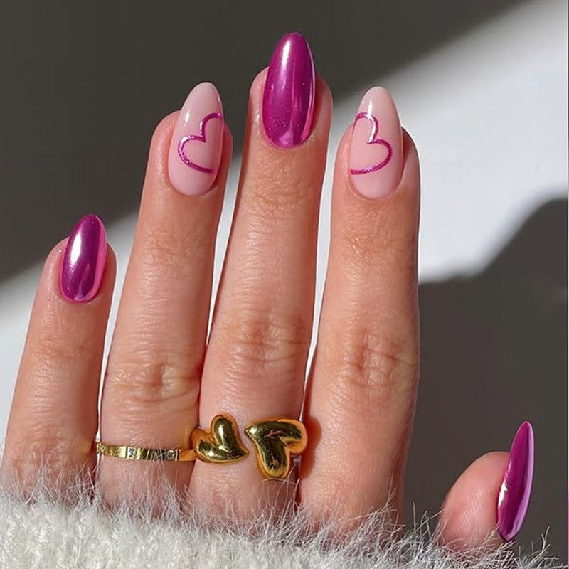 Kunstnagelset mit romantischem Herzdesign und glamourösen Akzenten Brehn
