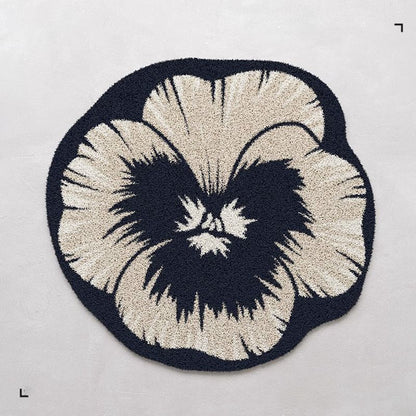 Blumenförmiger Teppich 1789754099
