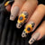 Kunstnägel mit Sonnenblumen-Motiv Brehn