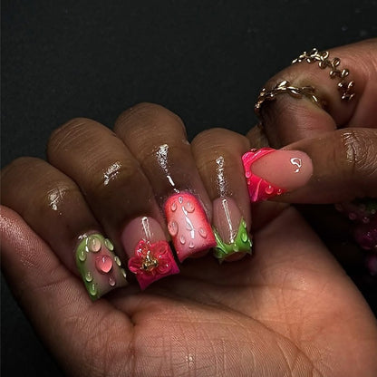Kunstnagelset mit fruchtigen und glitzernden Designs Brehn