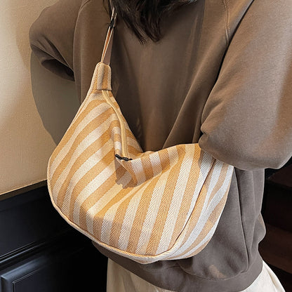 Lässige gestreifte Schultertasche