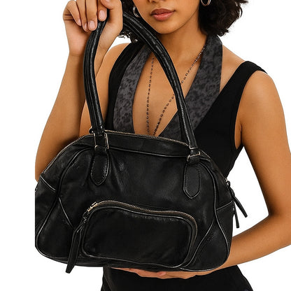 Multifunktionale Stepphandtasche