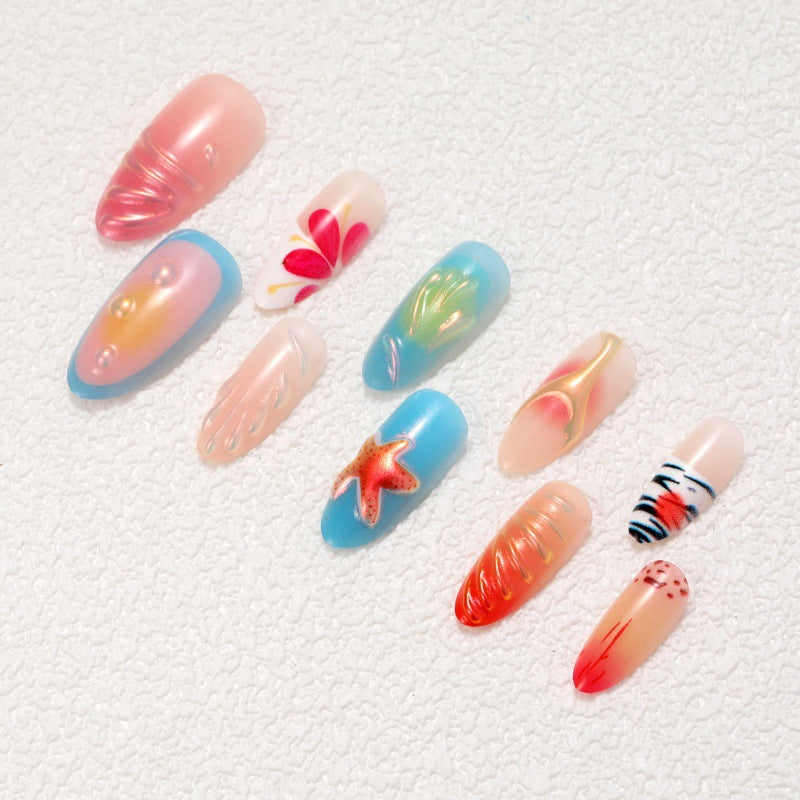 Kunstvolle Nagelspitzen mit maritimen Motiven Brehn