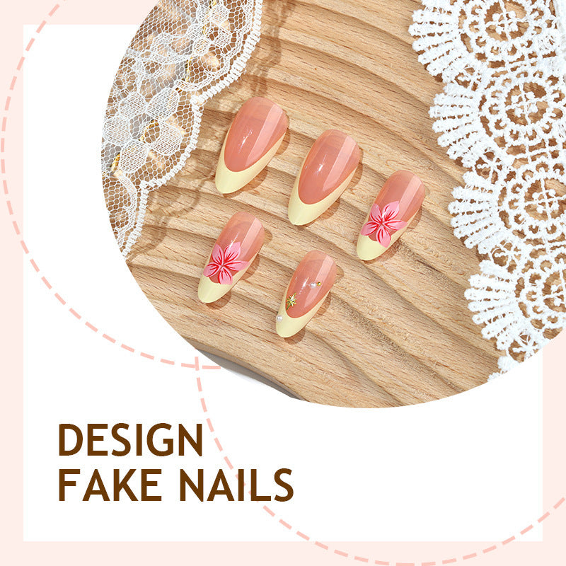 Kunstnagelset mit eleganten Blütenverzierungen und frischem Design Brehn