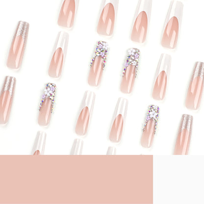Kunstvolle Nagelverlängerungen mit Glitzer- und Blumendekor Brehn