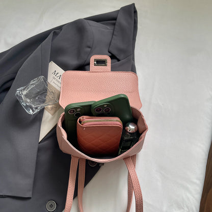 Kompakte klassische Handtasche