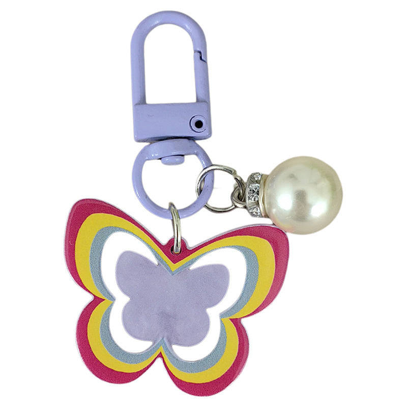 Schlüsselanhänger mit Schmetterling und Perlenakzent Brehn