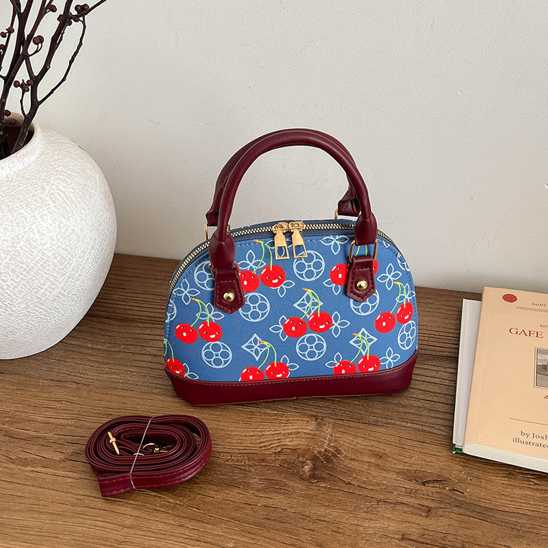 WoBestickte Kirschmuster-Handtasche Brehn