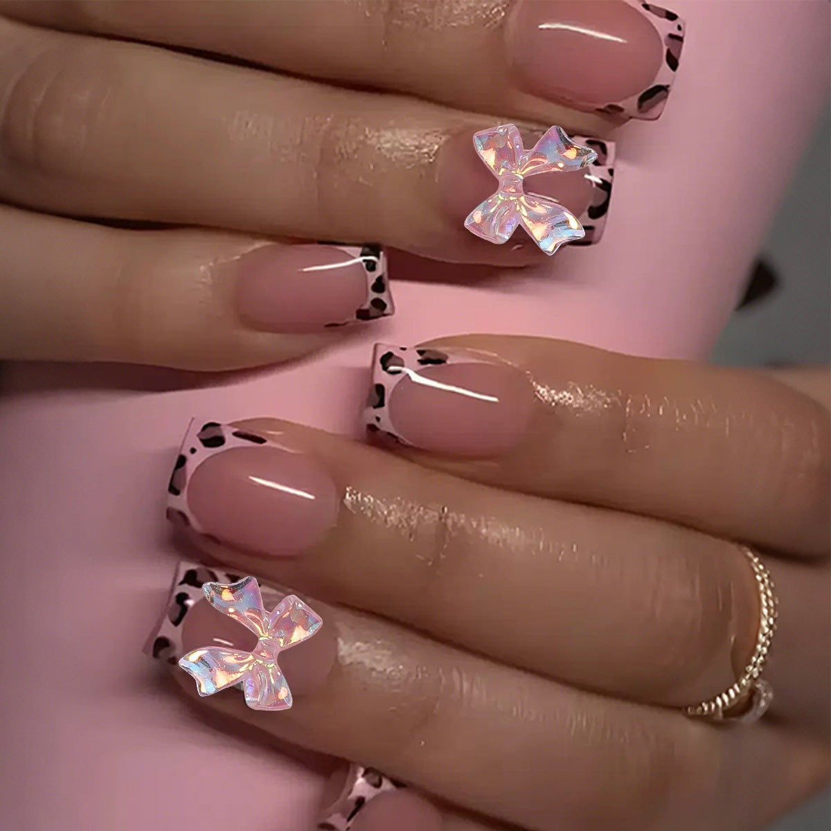 Kunstnagelset mit bunten Schleifen- und Leopardenmotiven Brehn
