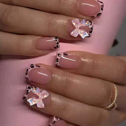 Kunstnagelset mit bunten Schleifen- und Leopardenmotiven Brehn
