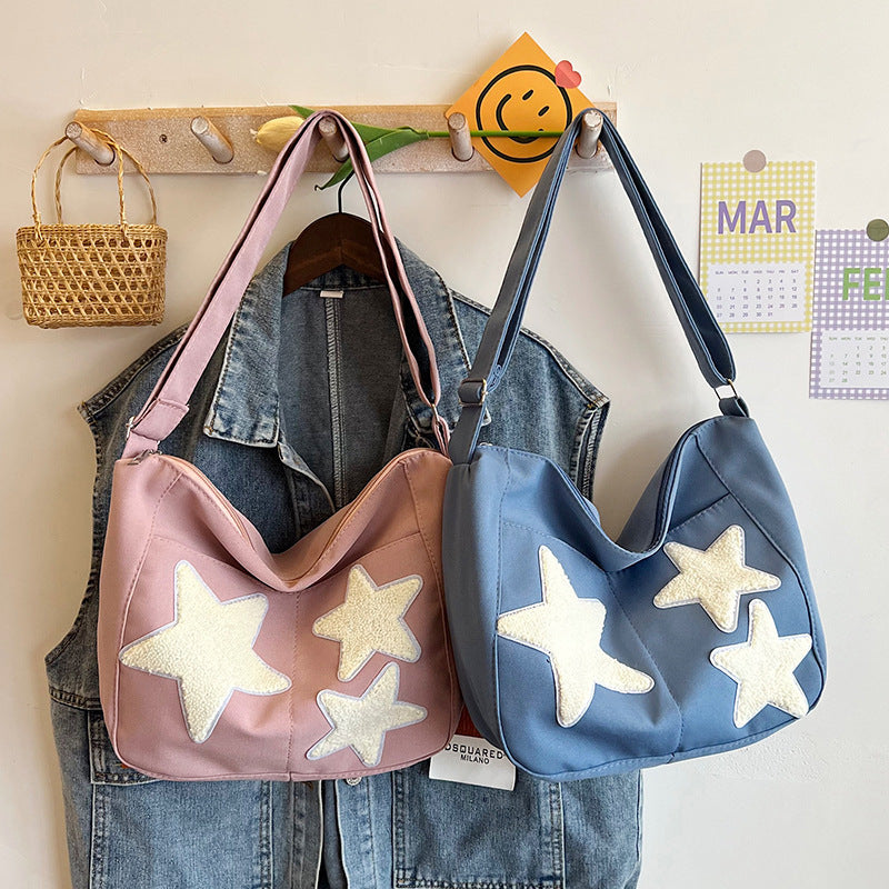 Lässige mit Sternen verzierte Schultertasche