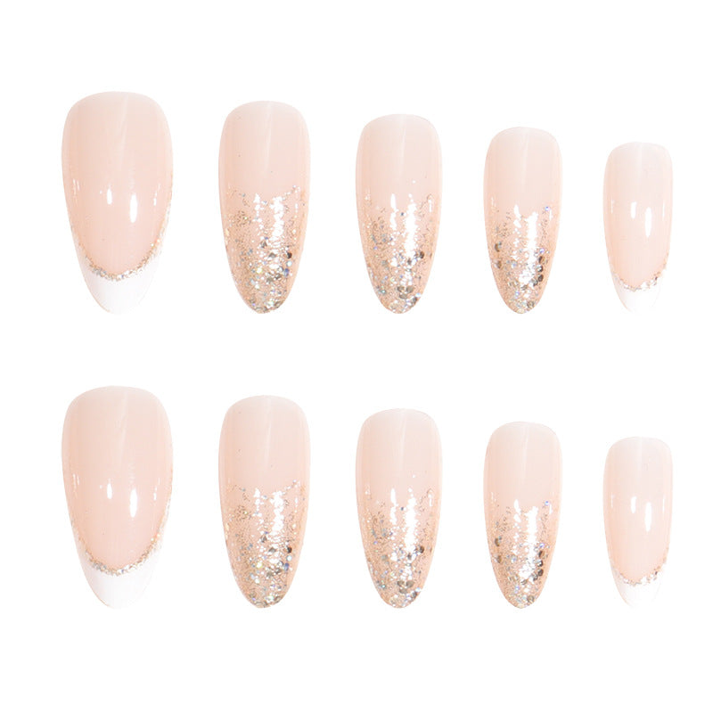 Elegantes Stiletto Press-On Nail Set mit Glitzer und französischer Spitze Brehn