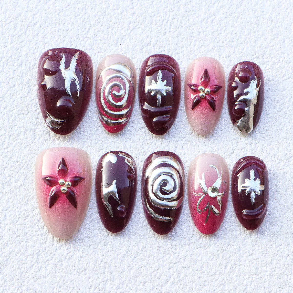 Luxuriöse dekorative Press-On-Nägel mit eleganten Designs