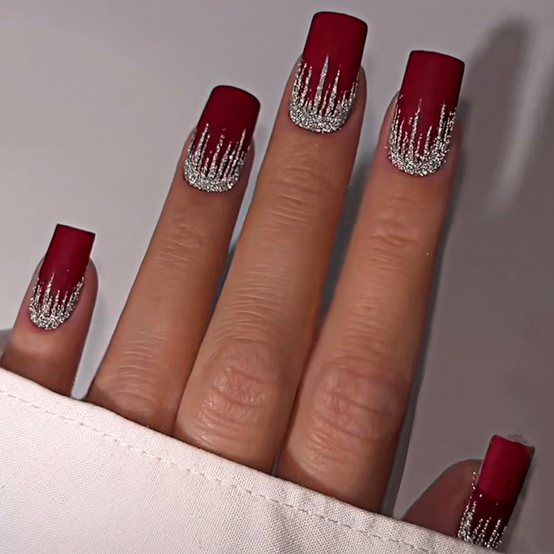 Künstlerisches Press-On Nail Set mit Silber Tropfen Design Brehn