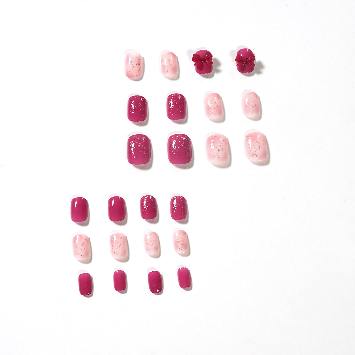 Künstliche Nagelkunst mit Glitzerverzierungen und niedlichem Schleifenmotiv Brehn