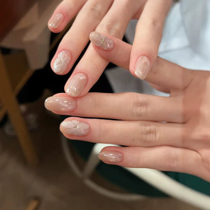 Künstlerische florale Press-On Nagelverzierungen