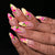 Kunstnagelset mit floralen Akzenten und glamourösem Finish Brehn