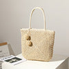 Handgefertigte Basttasche mit Pompon Details Brehn