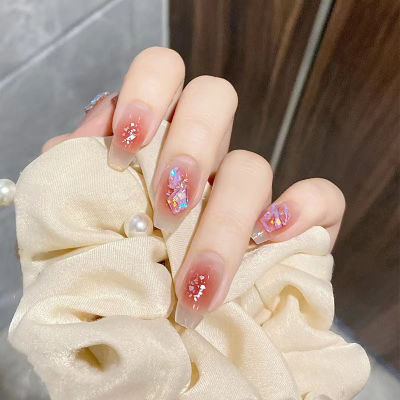 Kunstvolle Acryl-Nägel mit Glitzer-Elementen Brehn