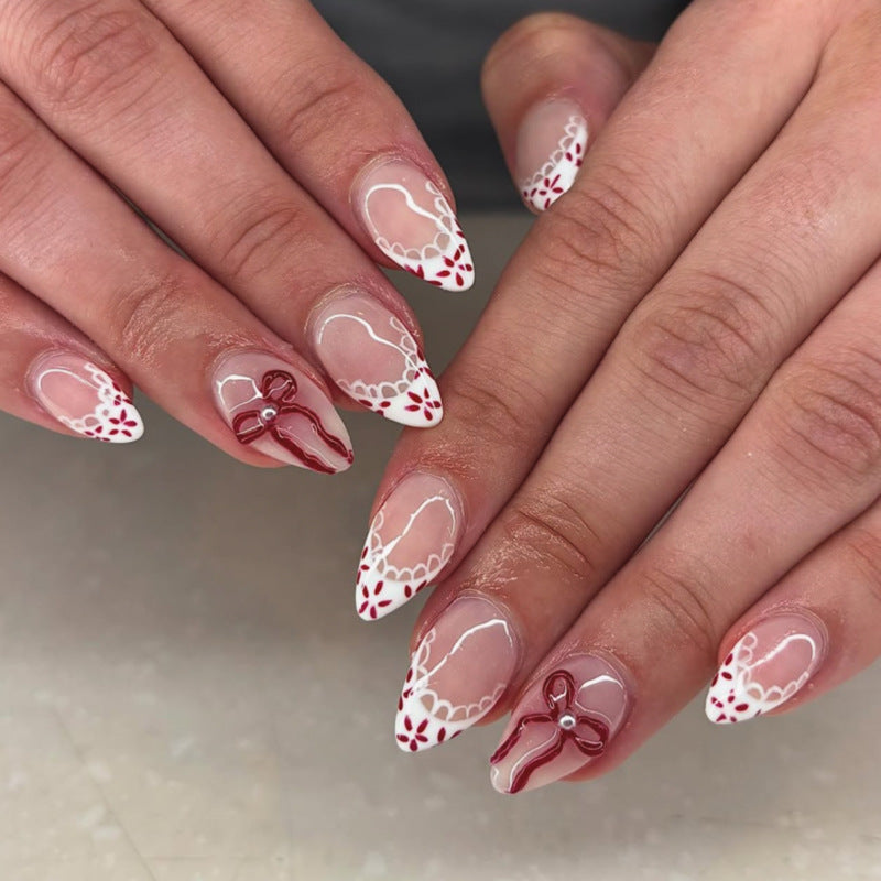 Kunstvolle Acryl-Nägel mit eleganten floralen Akzenten Brehn