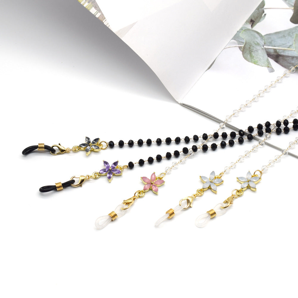 Eleganter mit Blumenakzenten verzierter Brillenketten Brehn