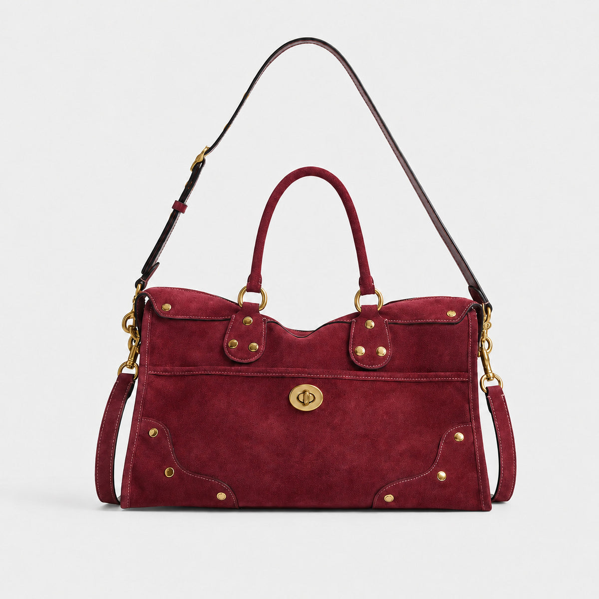 Elegante Wildlederhandtasche mit Messingakzenten