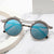 Damen modische runde Sonnenbrille mit extravagantem Design Brehn