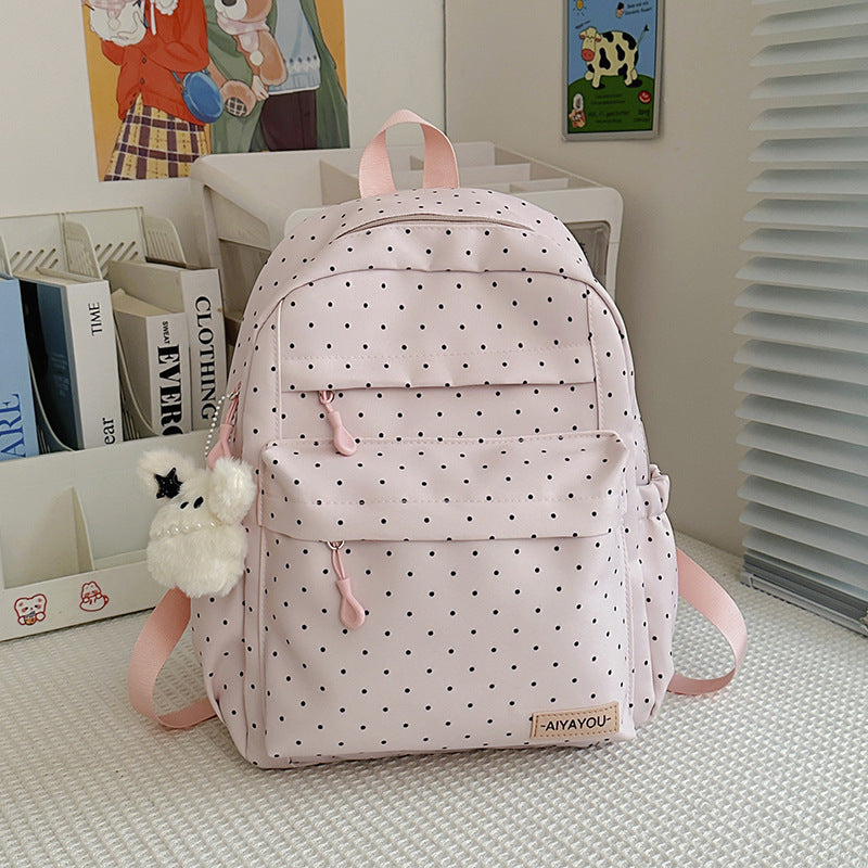 Verspielter gepunkteter Rucksack