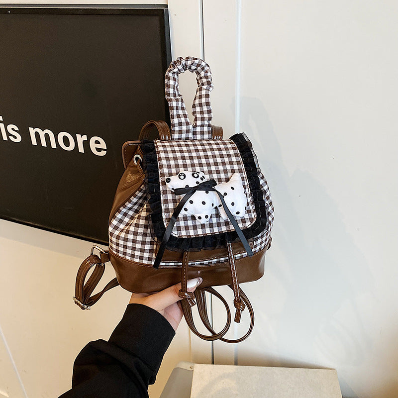Verspielter Rucksack mit Karomuster und Tierapplikation Brehn
