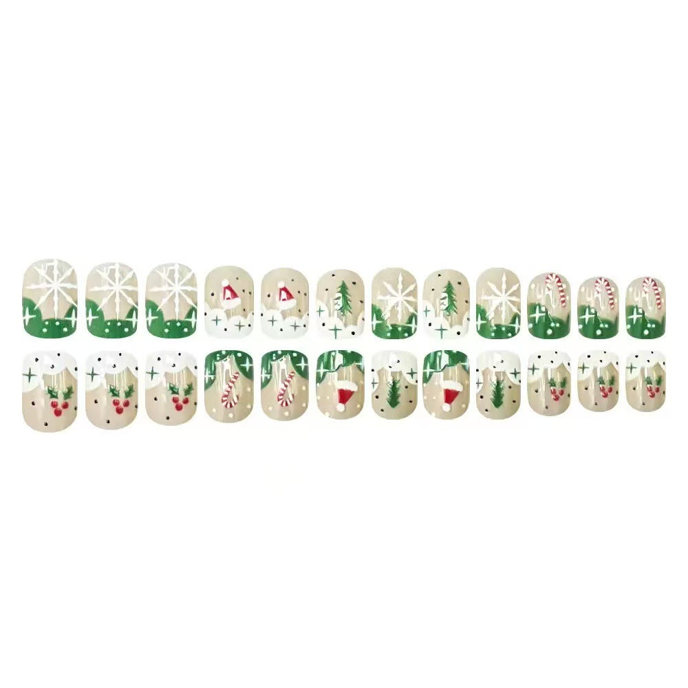 Kunstnagelset mit weihnachtlichen Motiven und Glitzerakzenten Brehn
