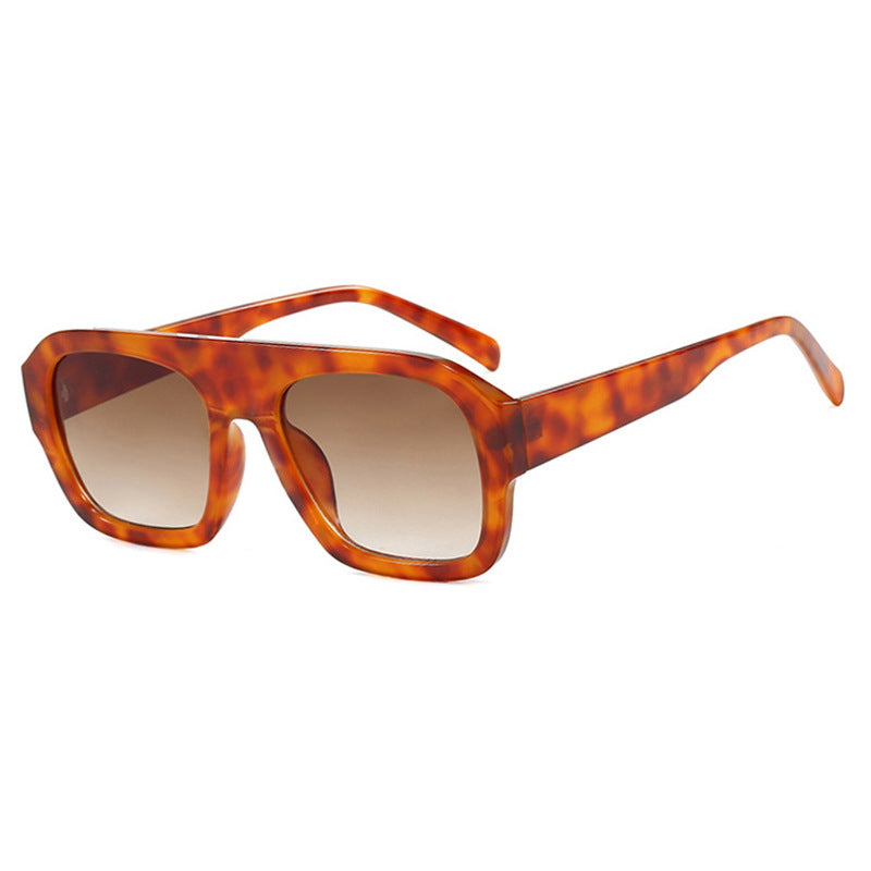 Damen modische Sonnenbrille mit robustem Rahmen und breiten Gläsern Brehn