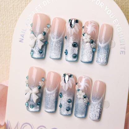 Kunstnagelset mit elegantem Glitzer-Design und feinen Verzierungen Brehn