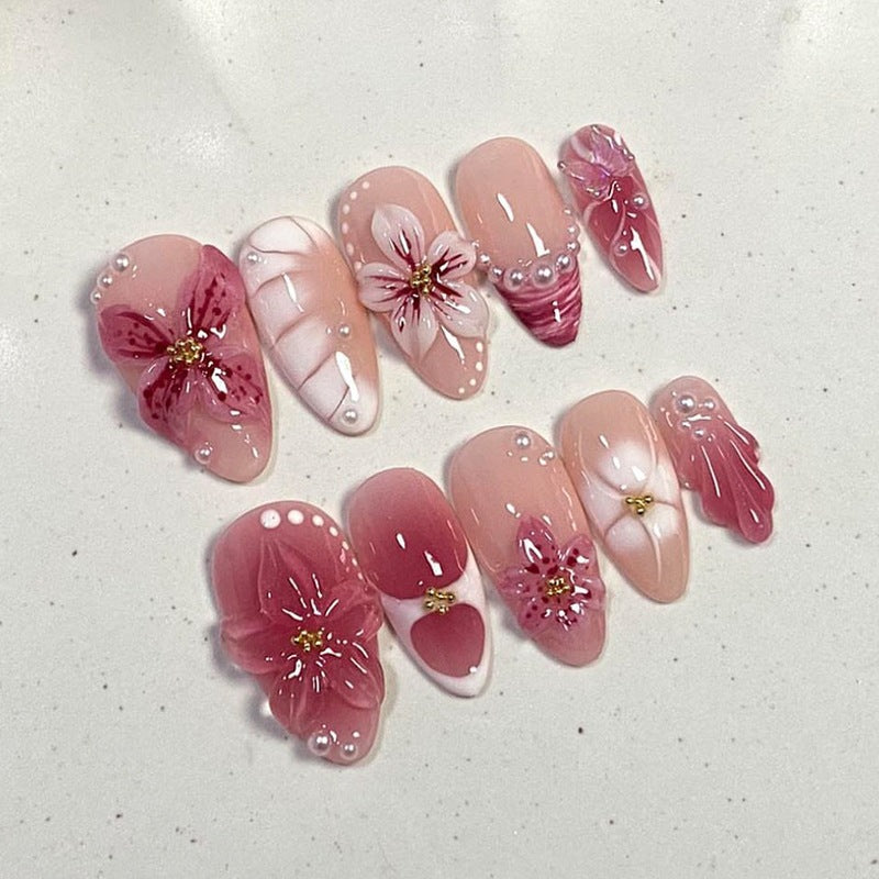 Kunstnagelset mit floralem Design und Glitzerakzenten Brehn