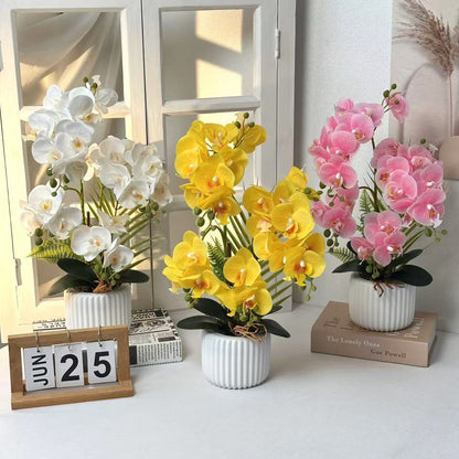 Künstliche Orchideenarrangement für dekorative Wohnbebilderung