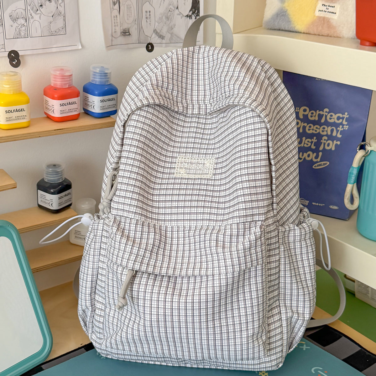 Stylischer gittergemusterter Tagesrucksack Brehn